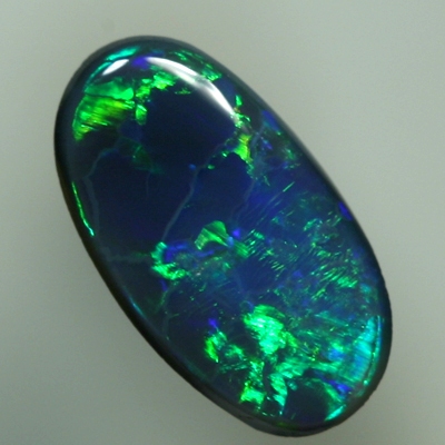 SOLID BLACK OPAL Bright green jumping brightly